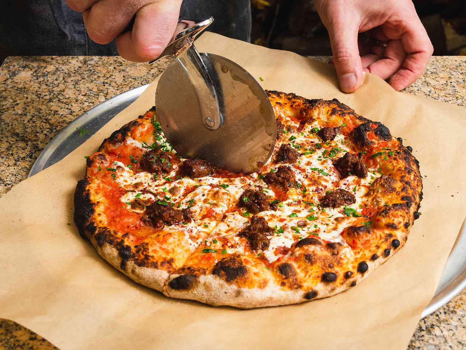 Slicing an "Armenian" pizza