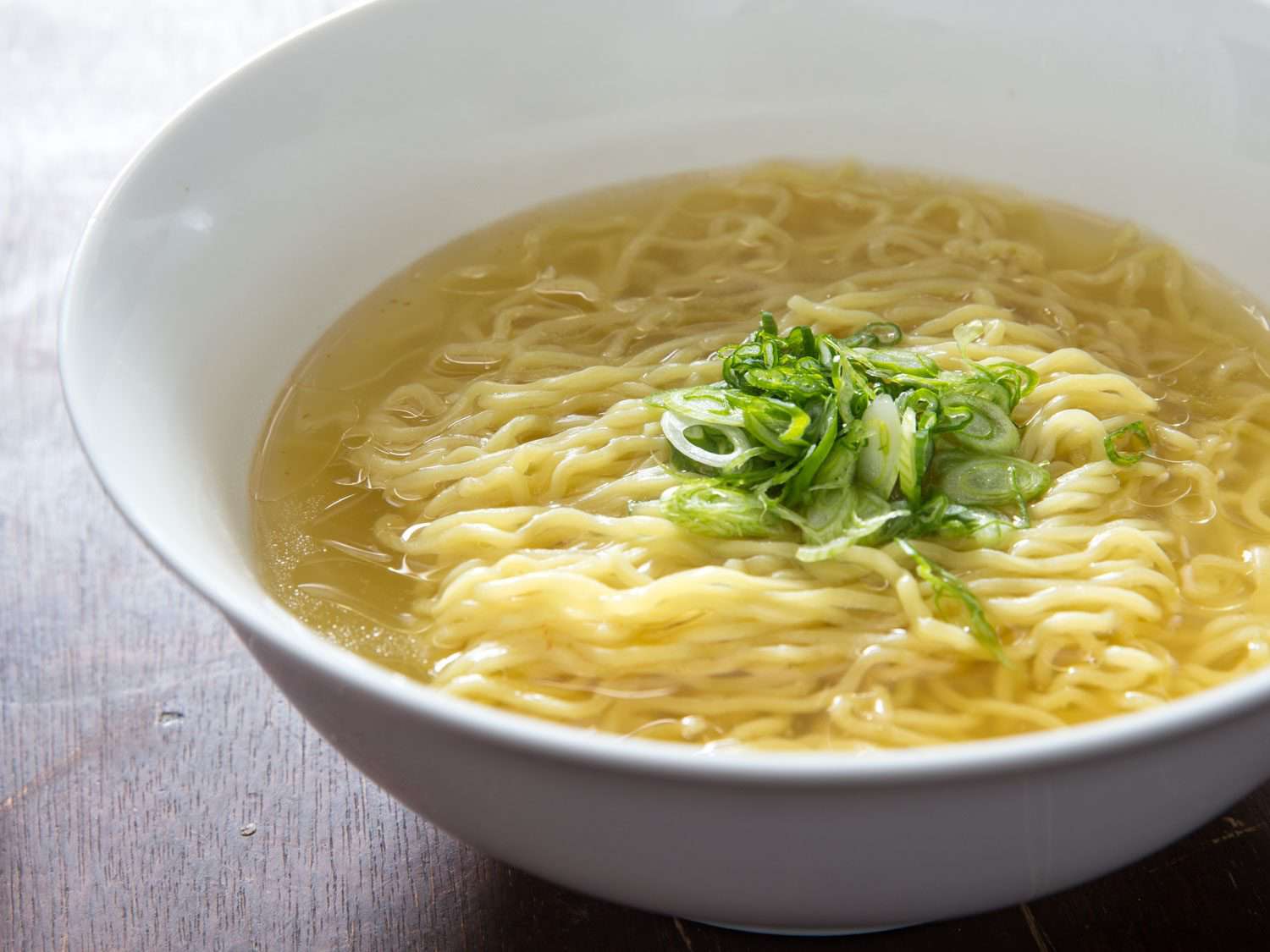 Side view of a bowl of shio ramen.
