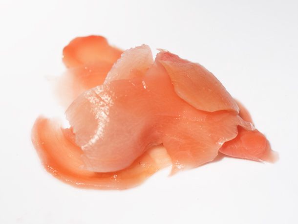 A closeup of pink Japanese pickled ginger. 