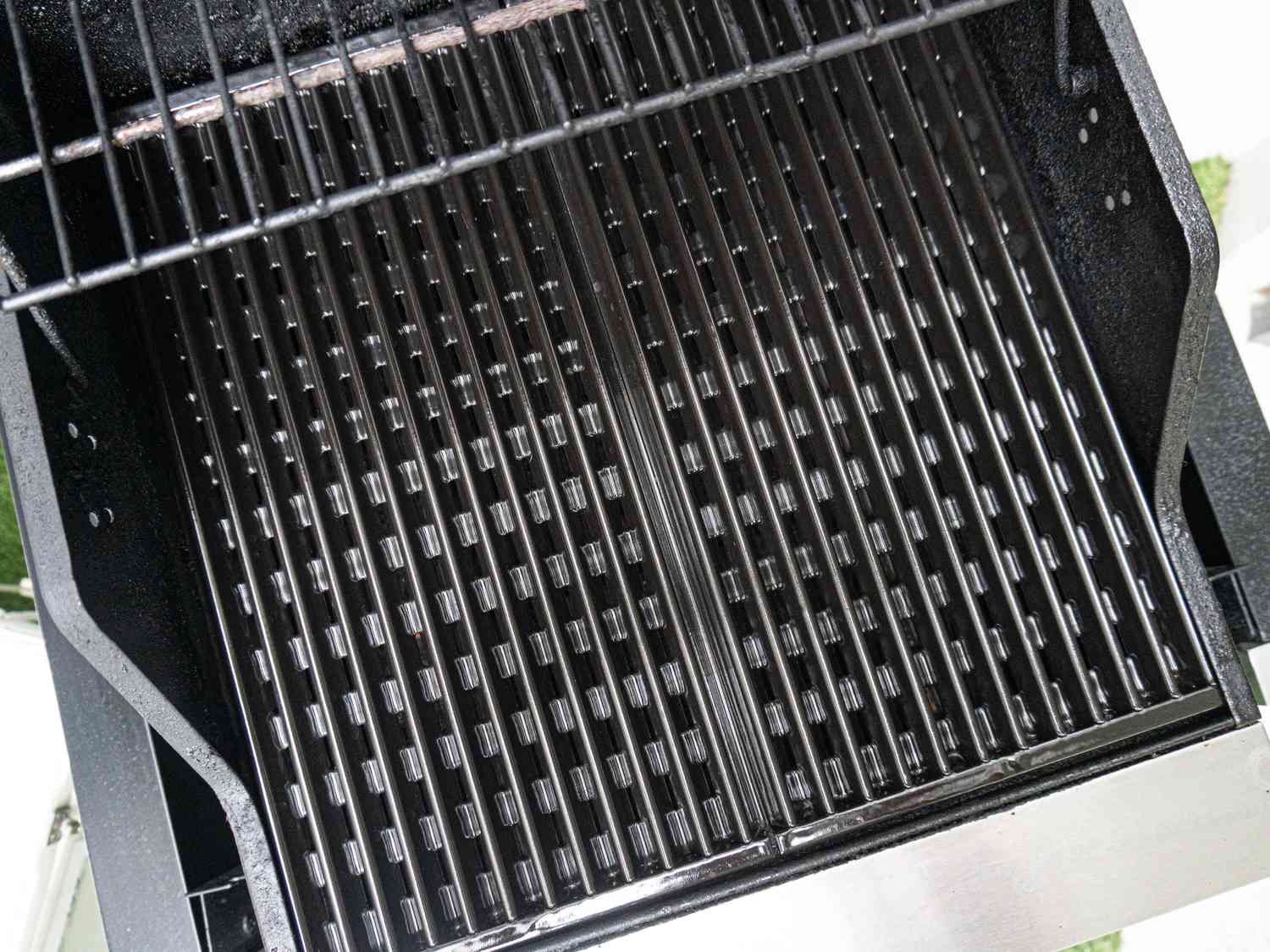 Cleaned and heated grill grates.