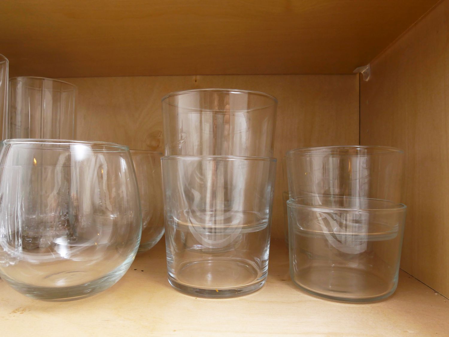 a closeup of two sets of glasses that stack together
