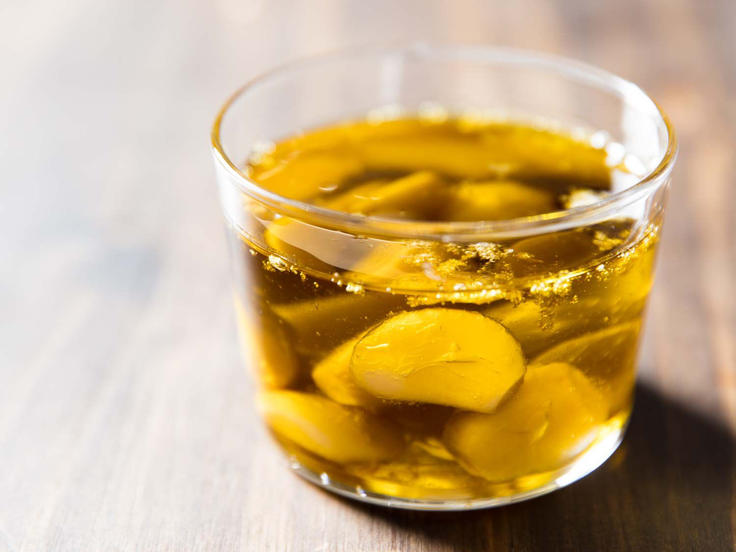 A jar of homemade garlic confit. 