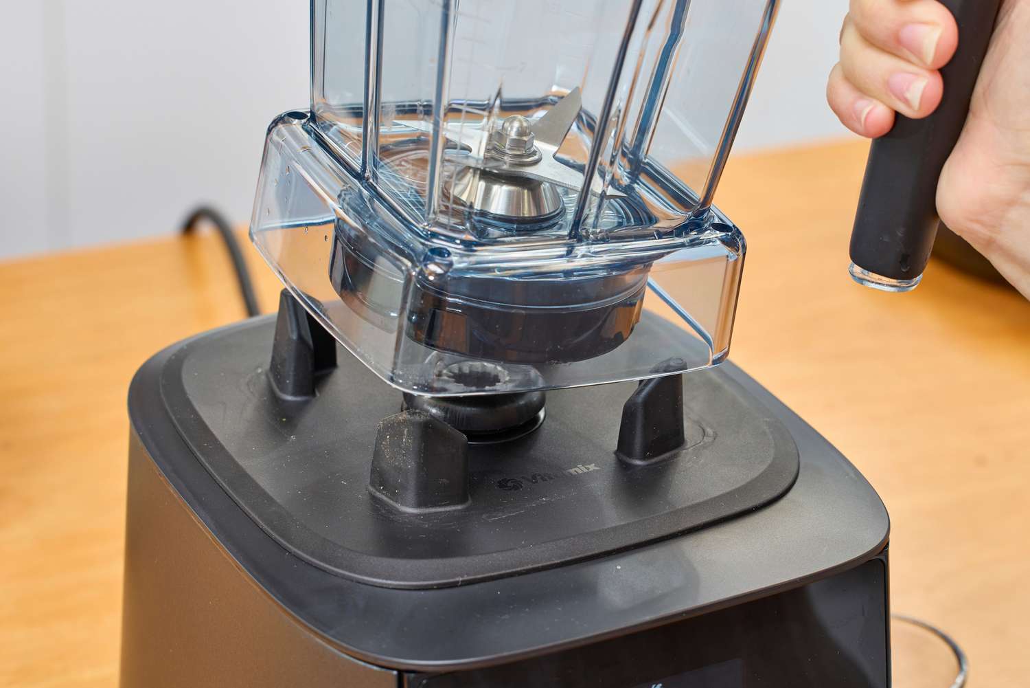 A close-up of the jar hovering over the base of the Vitamix Ascent X5 Blender