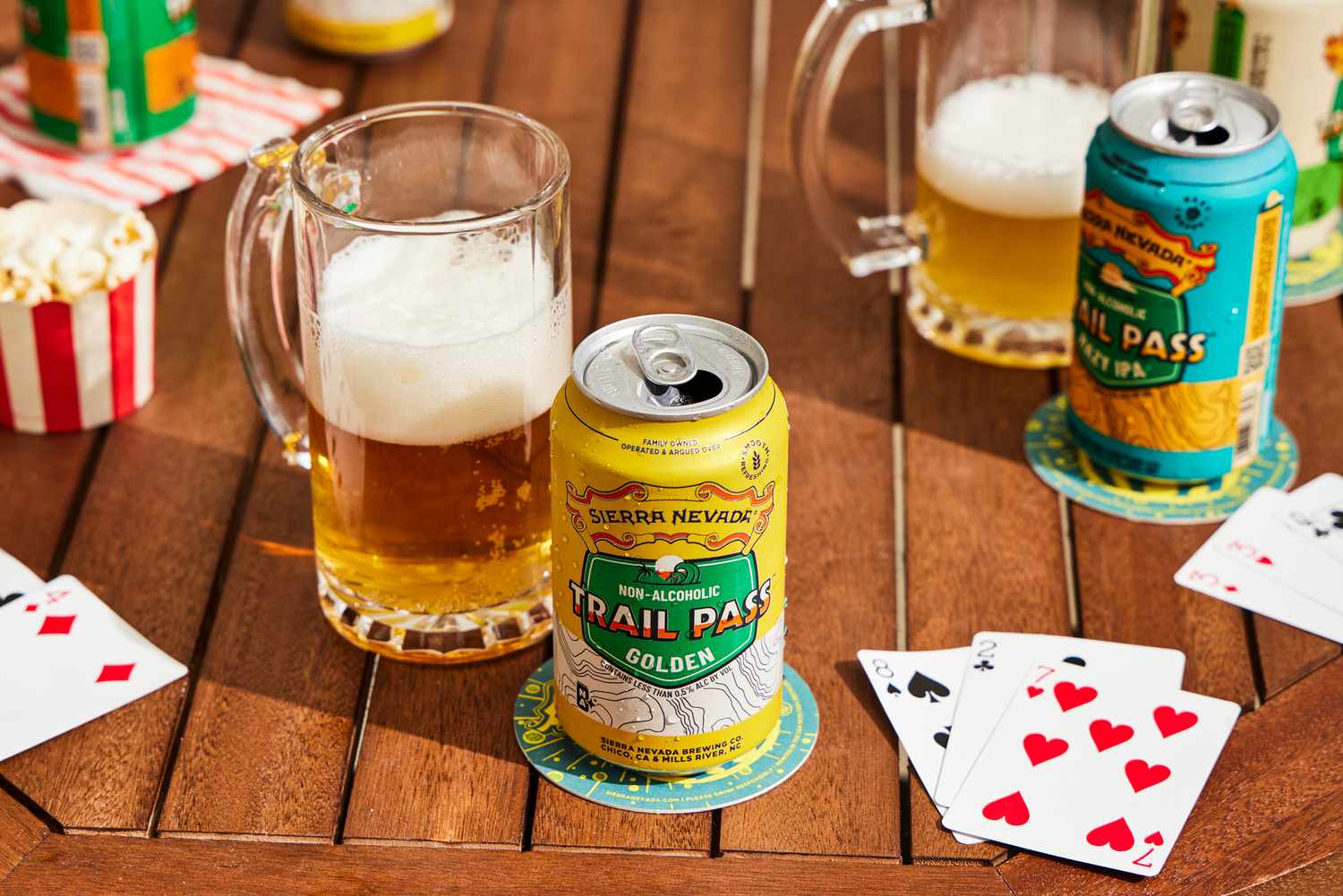 a can of sierra nevada trail pass in front of a glass