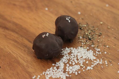chocolate truffles garnished with coarse sea salt and black pepper