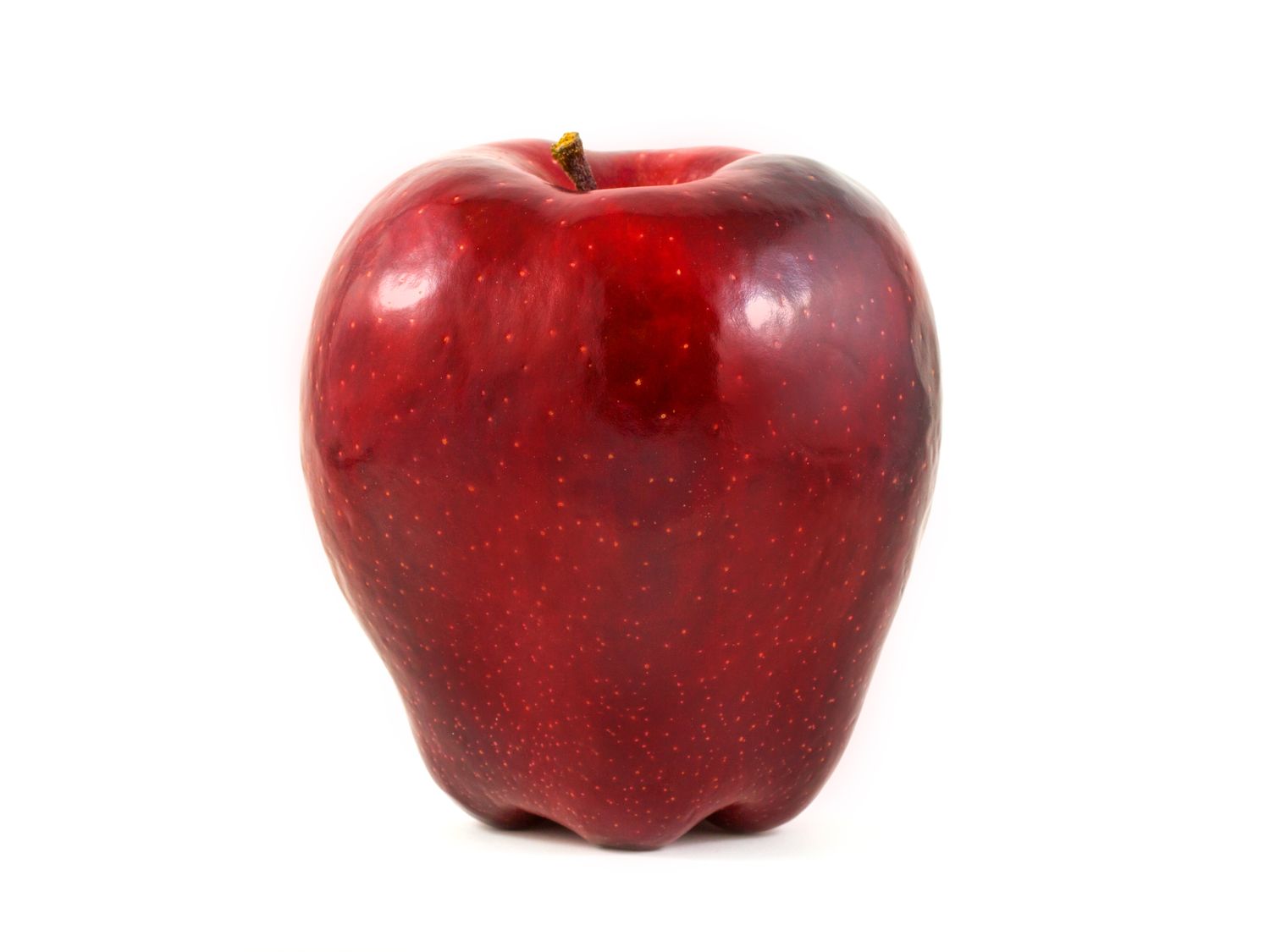 A whole apple isolated on a white background