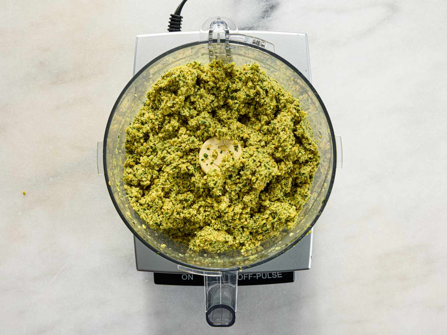 Falafel mixture in a food processor