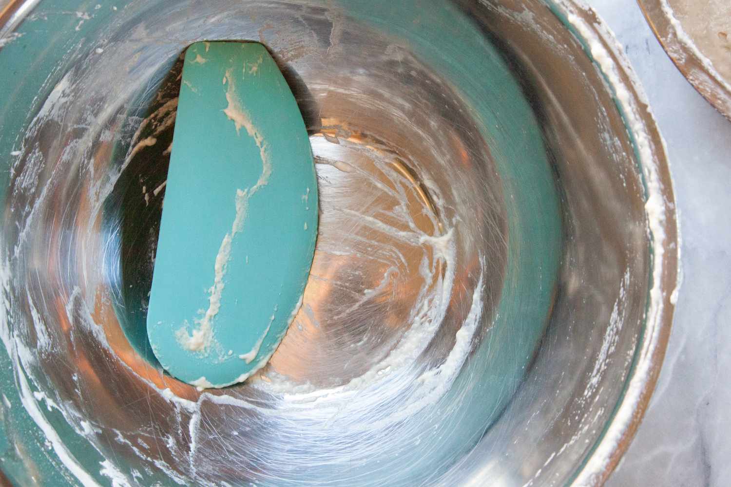 one of the kitchenaid scrapers in a bowl