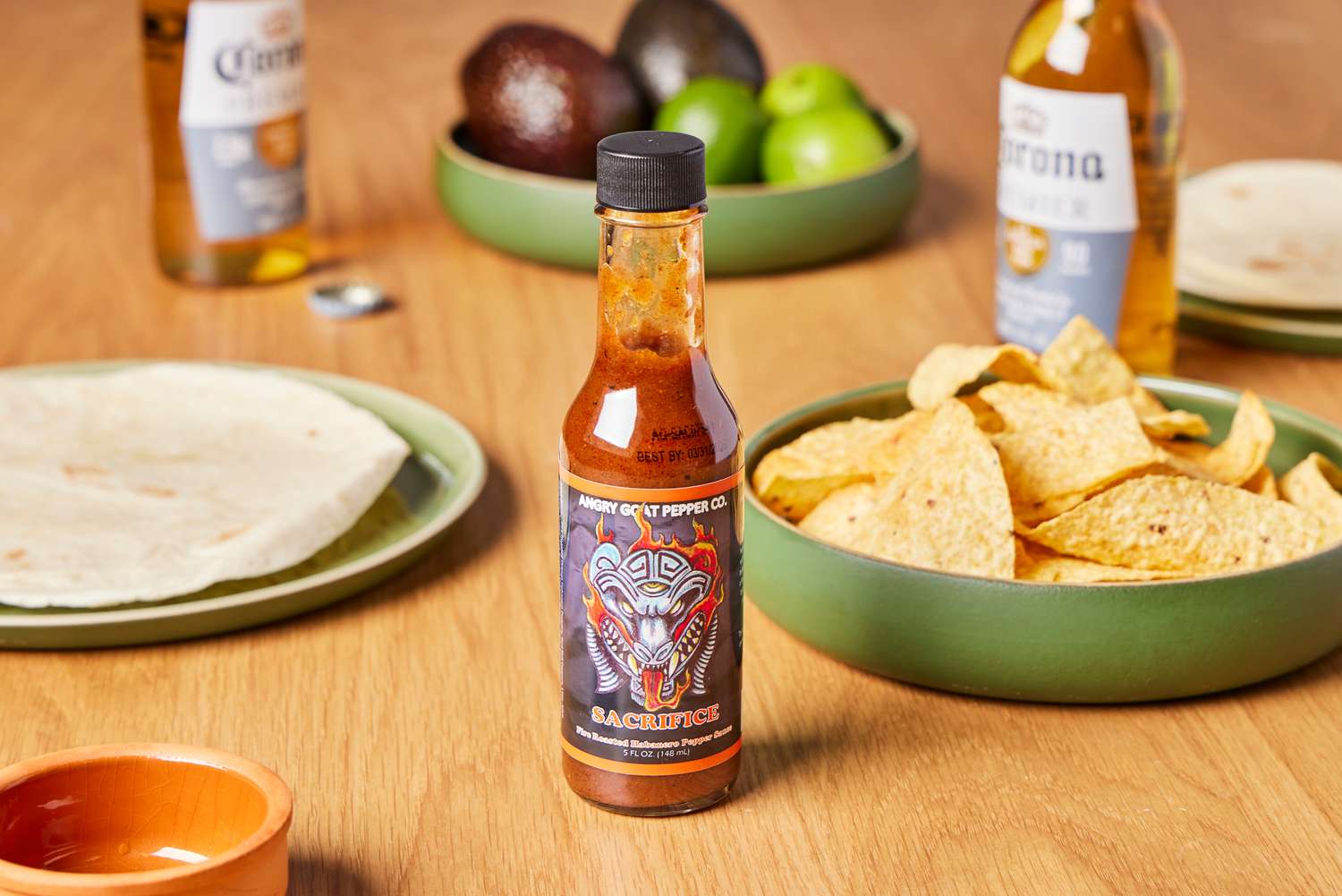 Angry Goat's Sacrifice Fire-Roasted Habanero Sauce on table