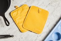 kitchenaid pot holders on a marble surface