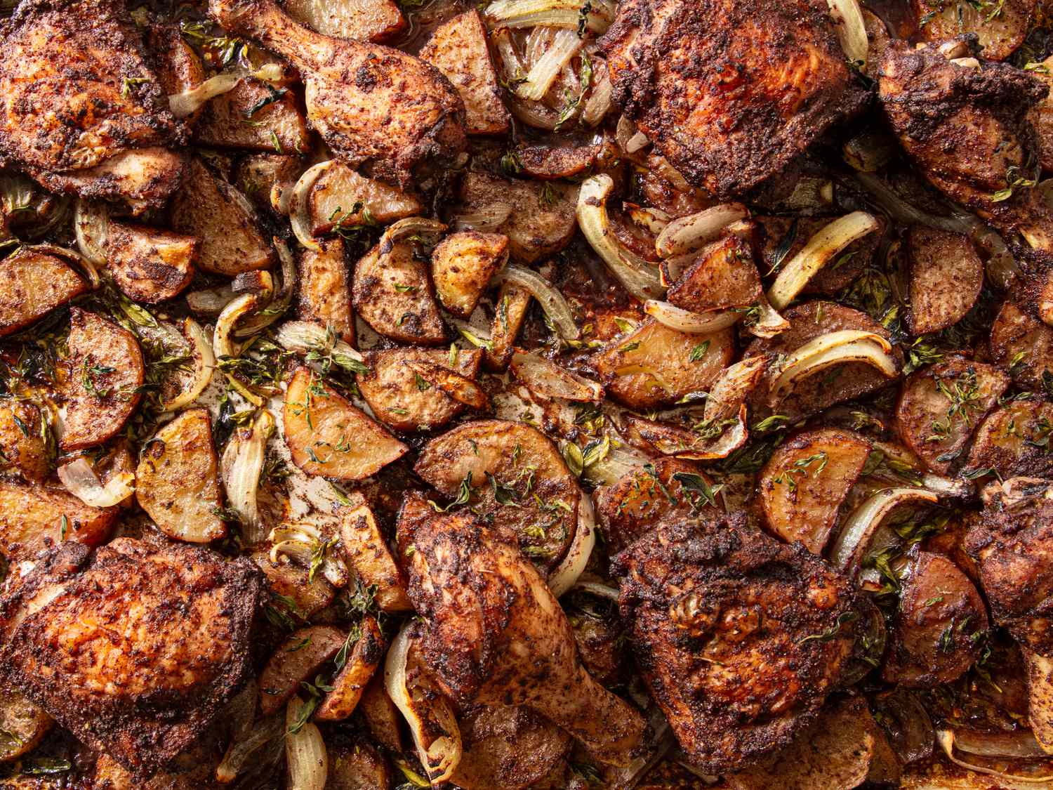 Sheet pan chicken and potatoes with onions