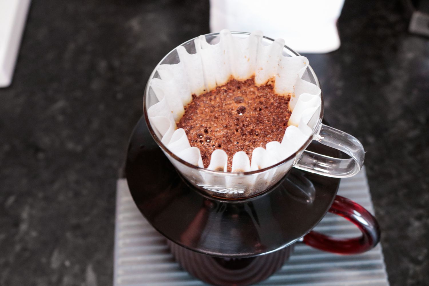 an overhead shot of the coffee brewing in the kalita wave 155