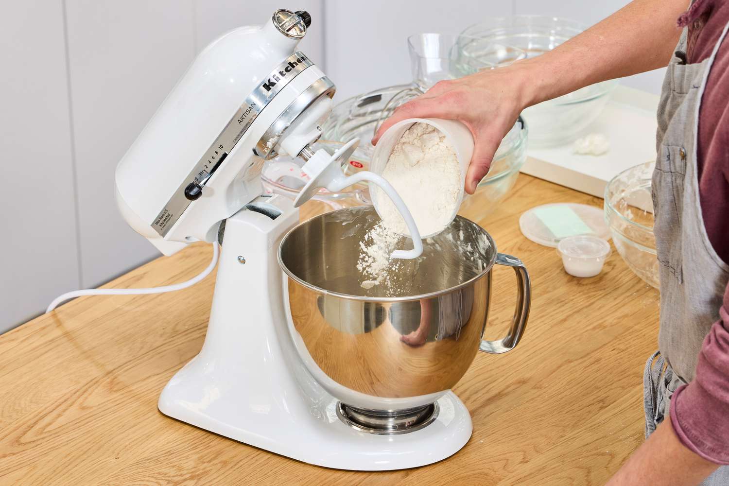 Tester putting ingredients into KitchenAid Artisan Series