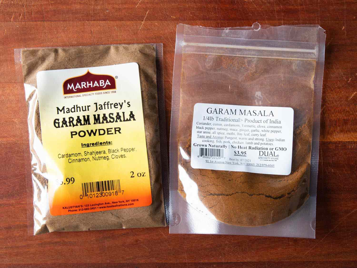 Side by side comparison of ingredients lists for two store-bought garam masalas