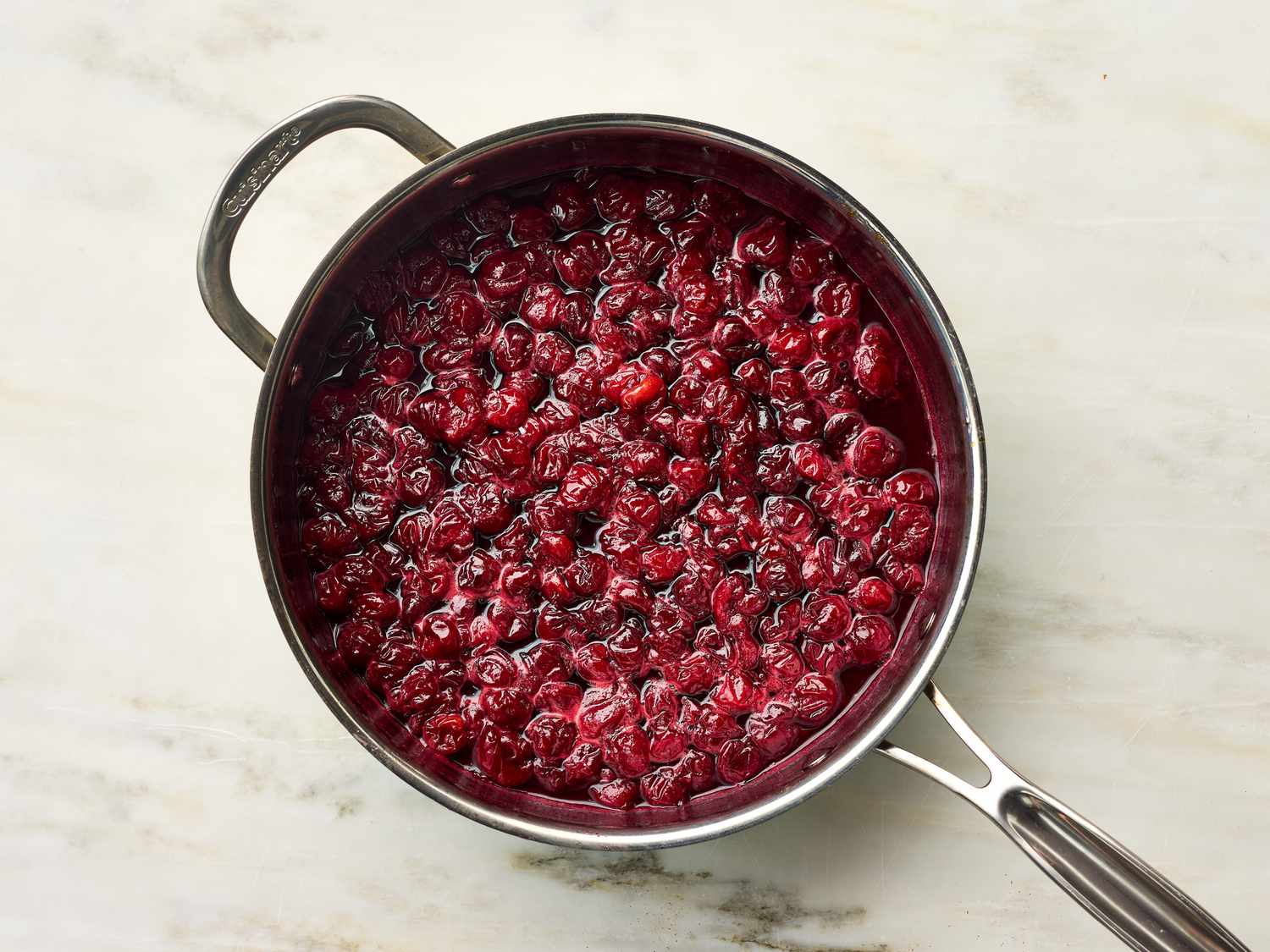 A pan containing a cooked cherry mixture