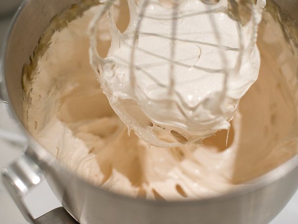 The finished meringue mixture in the mixer, ready to add pistachios to.