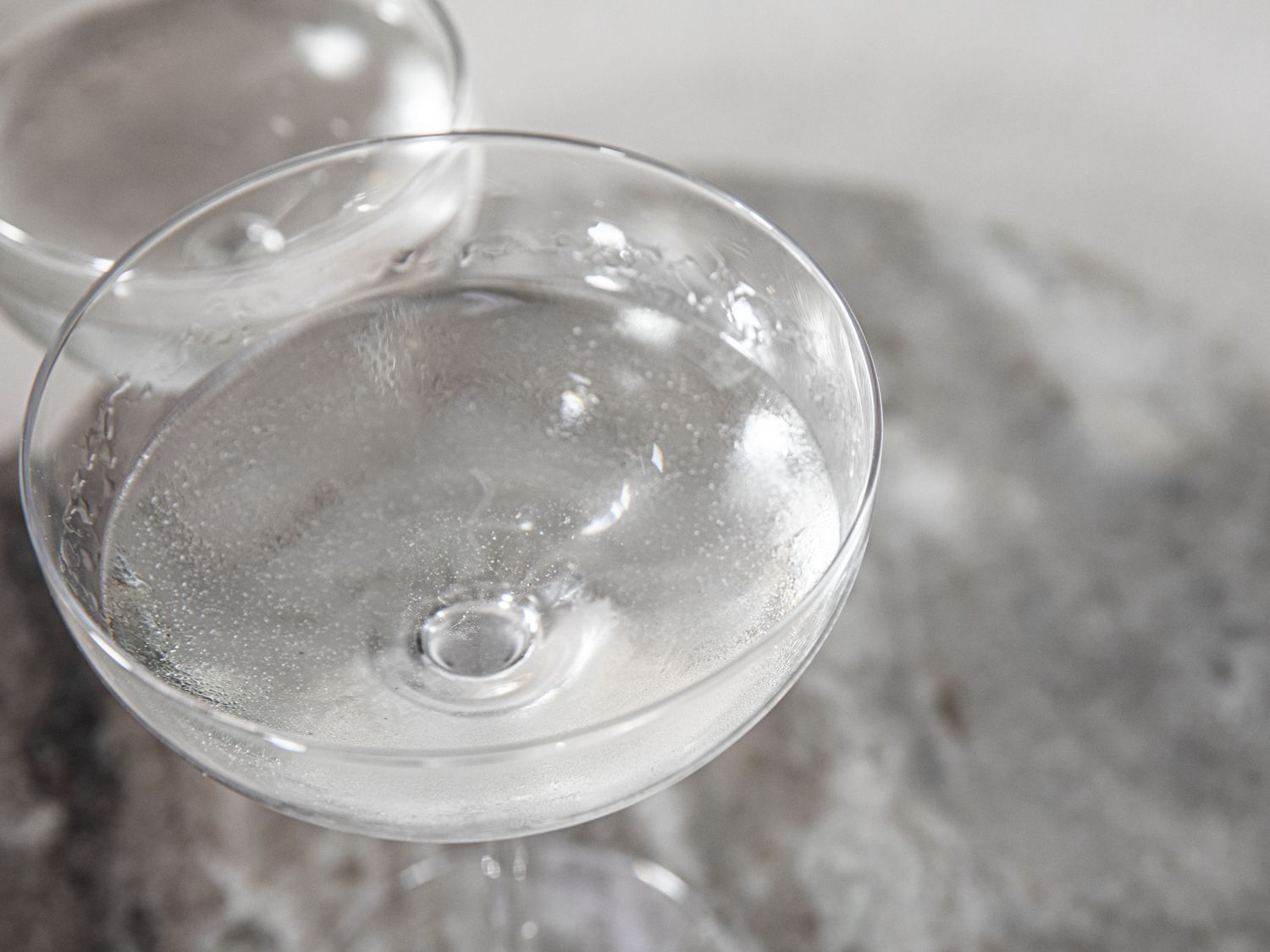 Two party fully coupe glasses sitting side by side