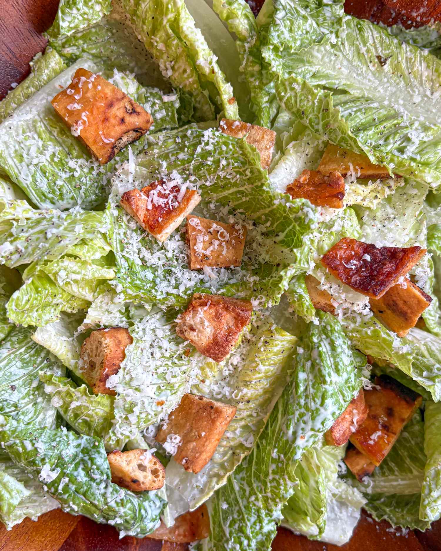 Romaine lettuce with croutons and grated cheese
