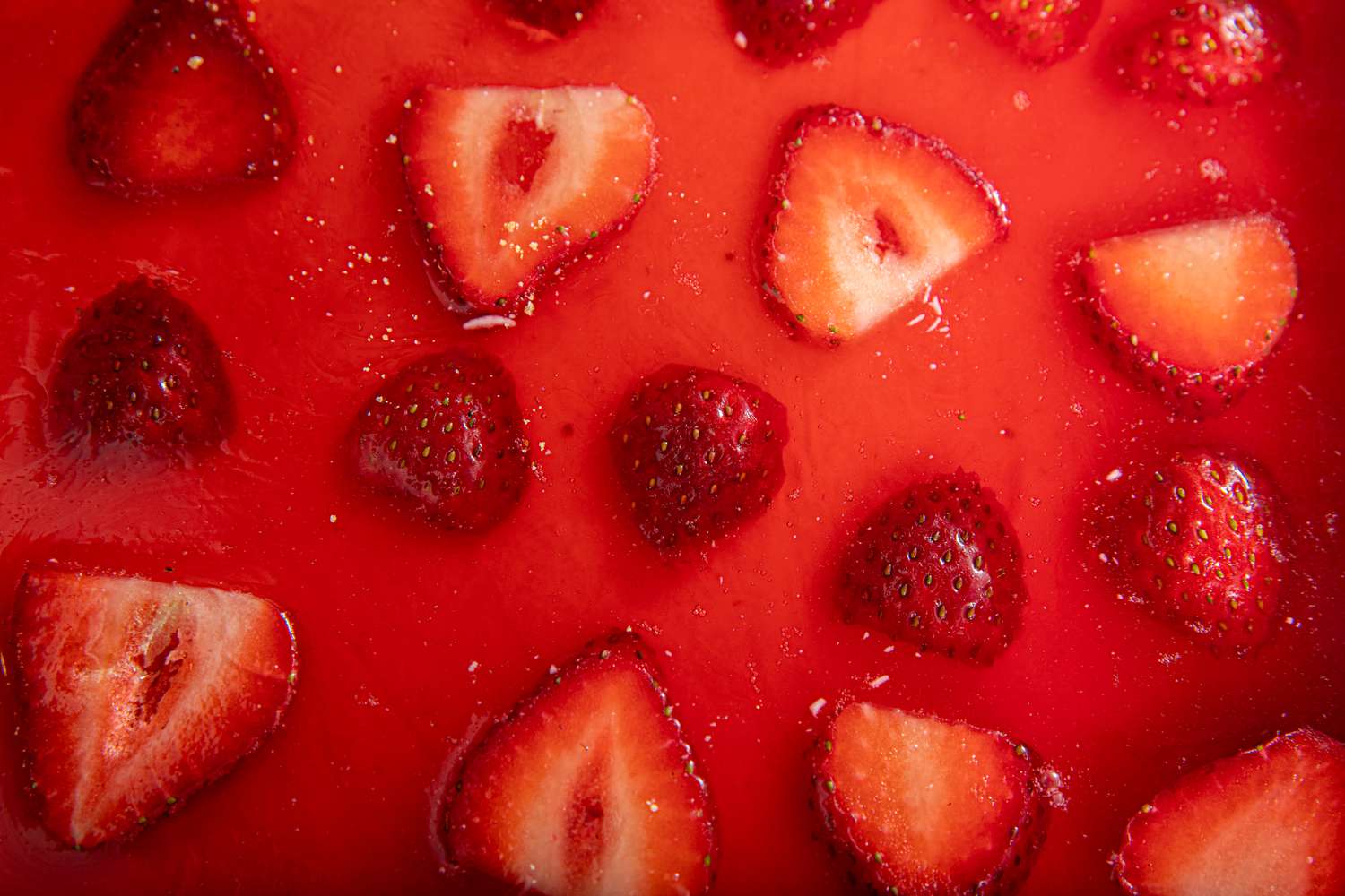 Overhead view of strawberries in jello
