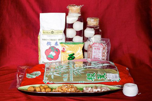 A grouping of the packaged ingredients needed to make joong.