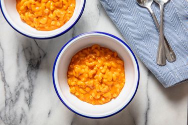 Overhead shot of two bowls of stovetop mac and cheese with 'nduja
