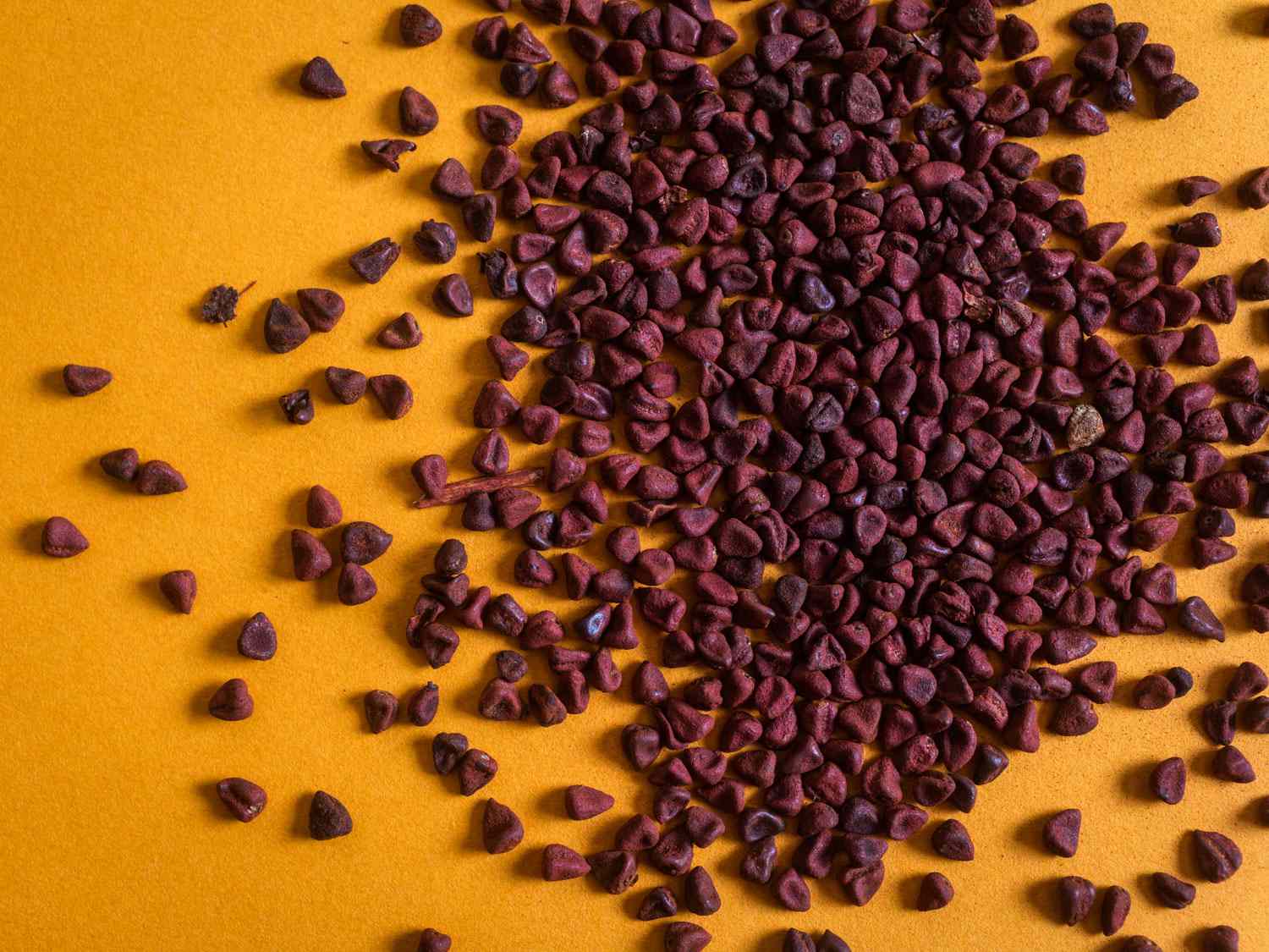 A pile of dried achiote (annatto seed)