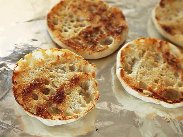 cooked English muffins on tin foil