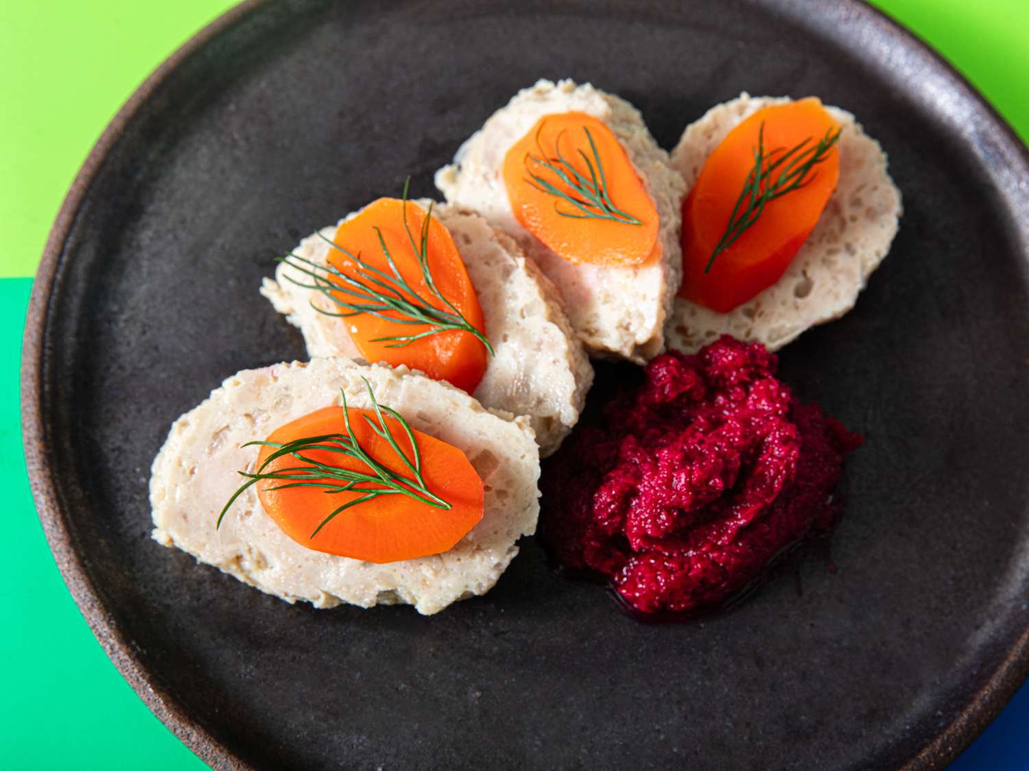Side view of gefilte fish on a plate