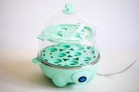 The Dash egg cooker on a white background