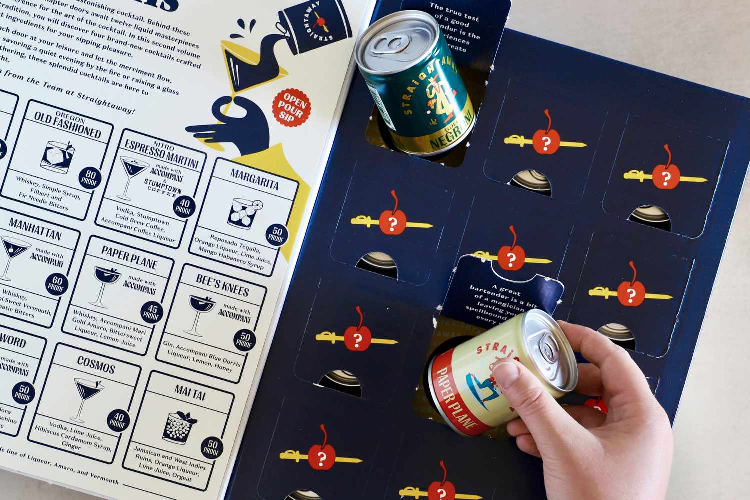 The interior of the Straightaway 12 Days of Cocktails with two cocktails pulled out