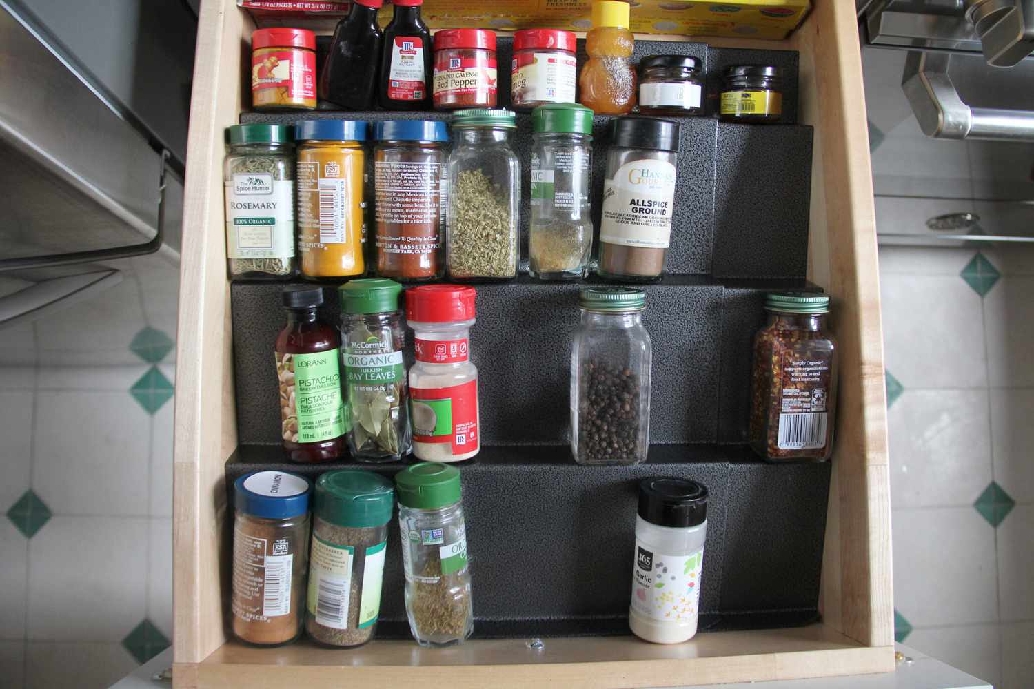 a spice rack in a drawer with spices on it