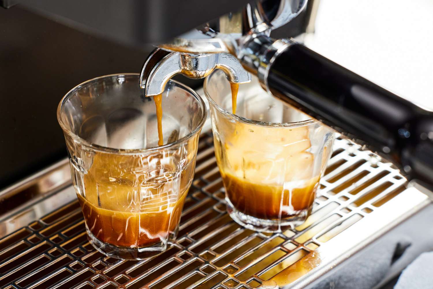 Closeup of the Diletta Mio Espresso Machine brewing two espressos