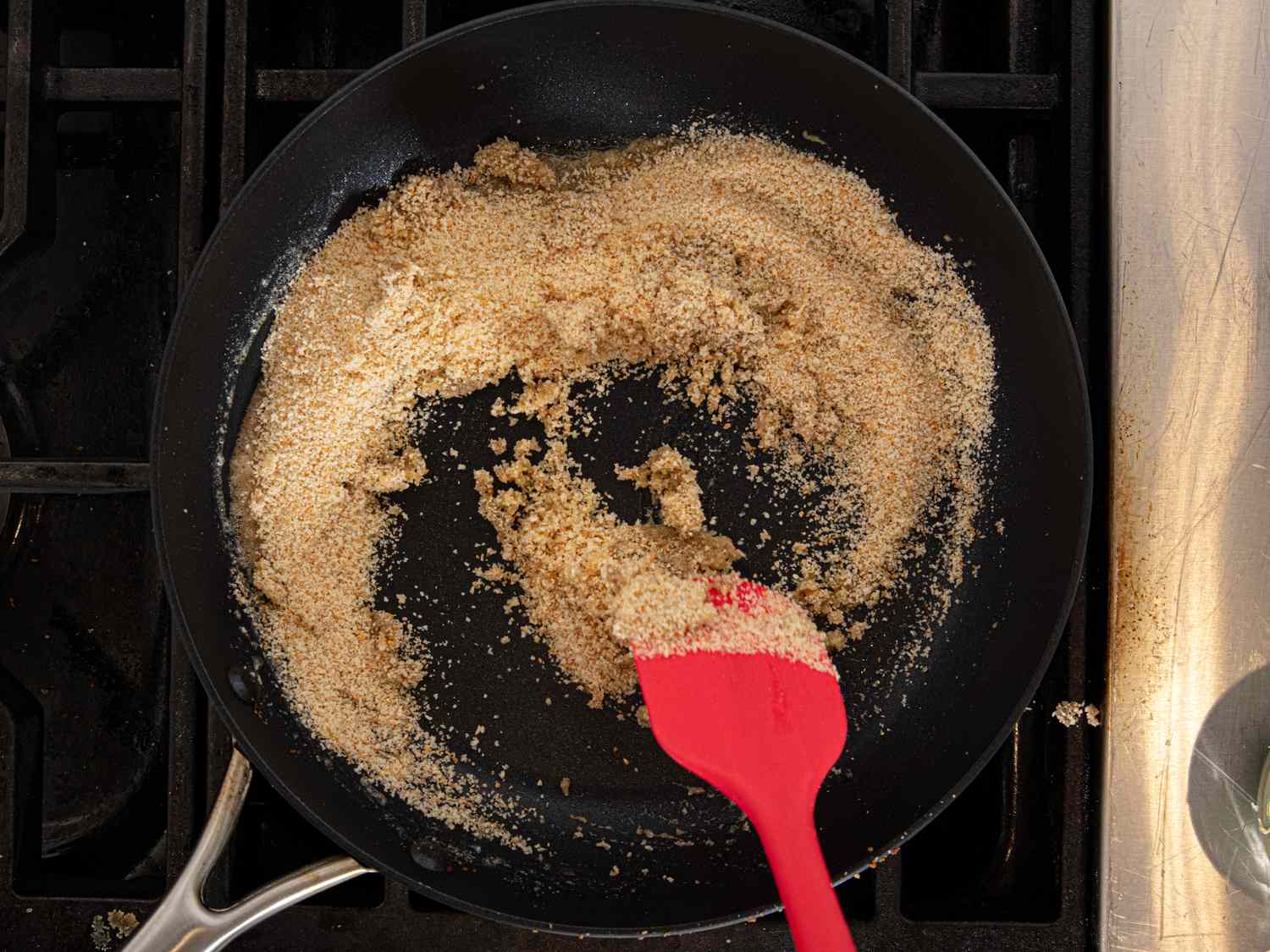 Overhead view of toasting breadcrumbs