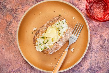 Overhead view of air fryer baked potato