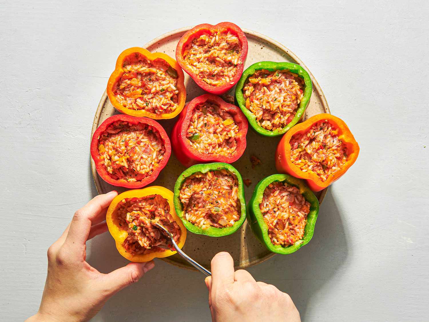 Overhead view of filling peppers