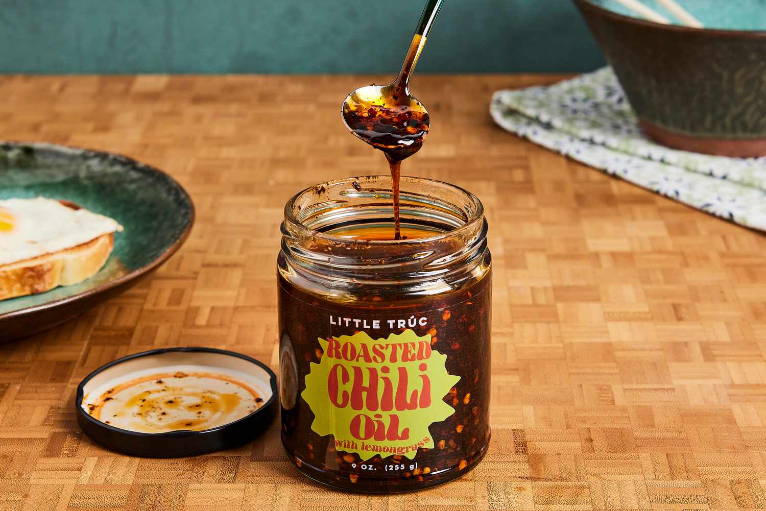 Little Truc Roasted Chili Oil being scooped