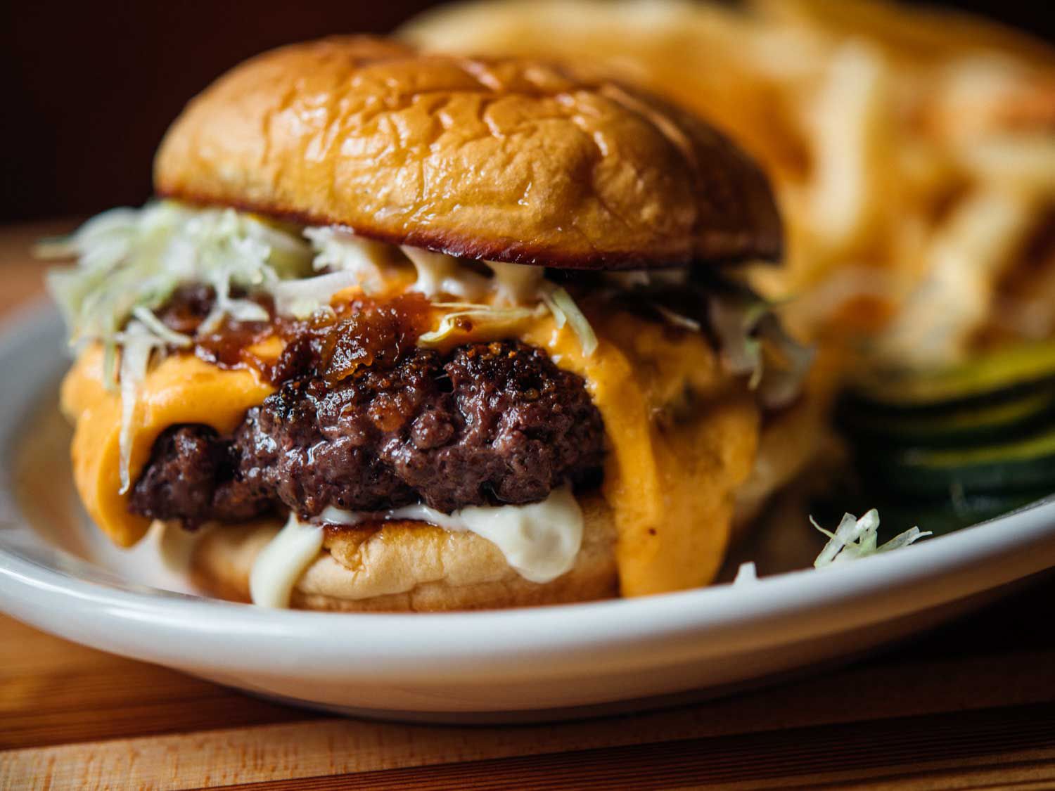 A decadent burger at Palm & Pine.