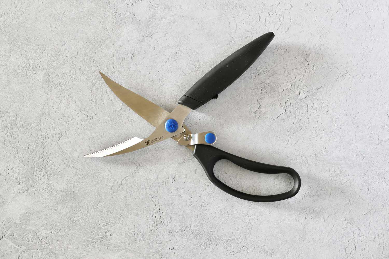 Henckels shears on a gray backdrop