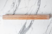 J.K. Adams Dowel Rolling Pin on a marble surface