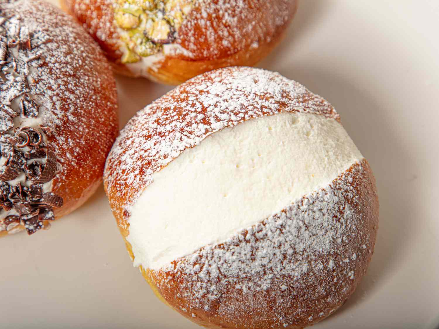 Maritozzi with powdered sugar