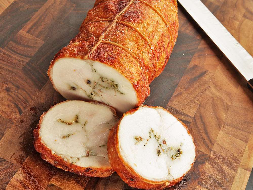 sliced deep-fried turchetta on cutting board