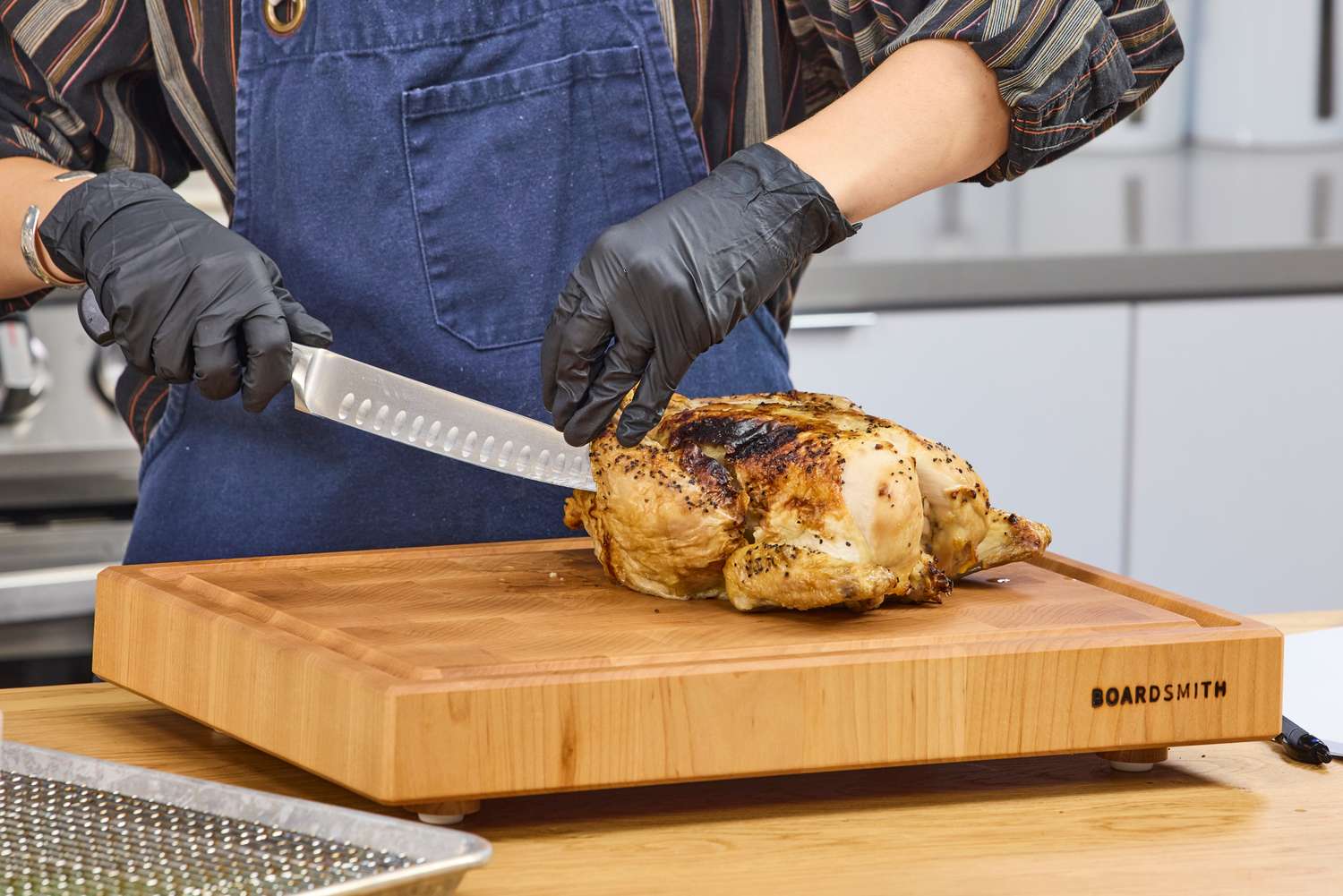Chicken is cut with the Wüsthof Classic Carving Set