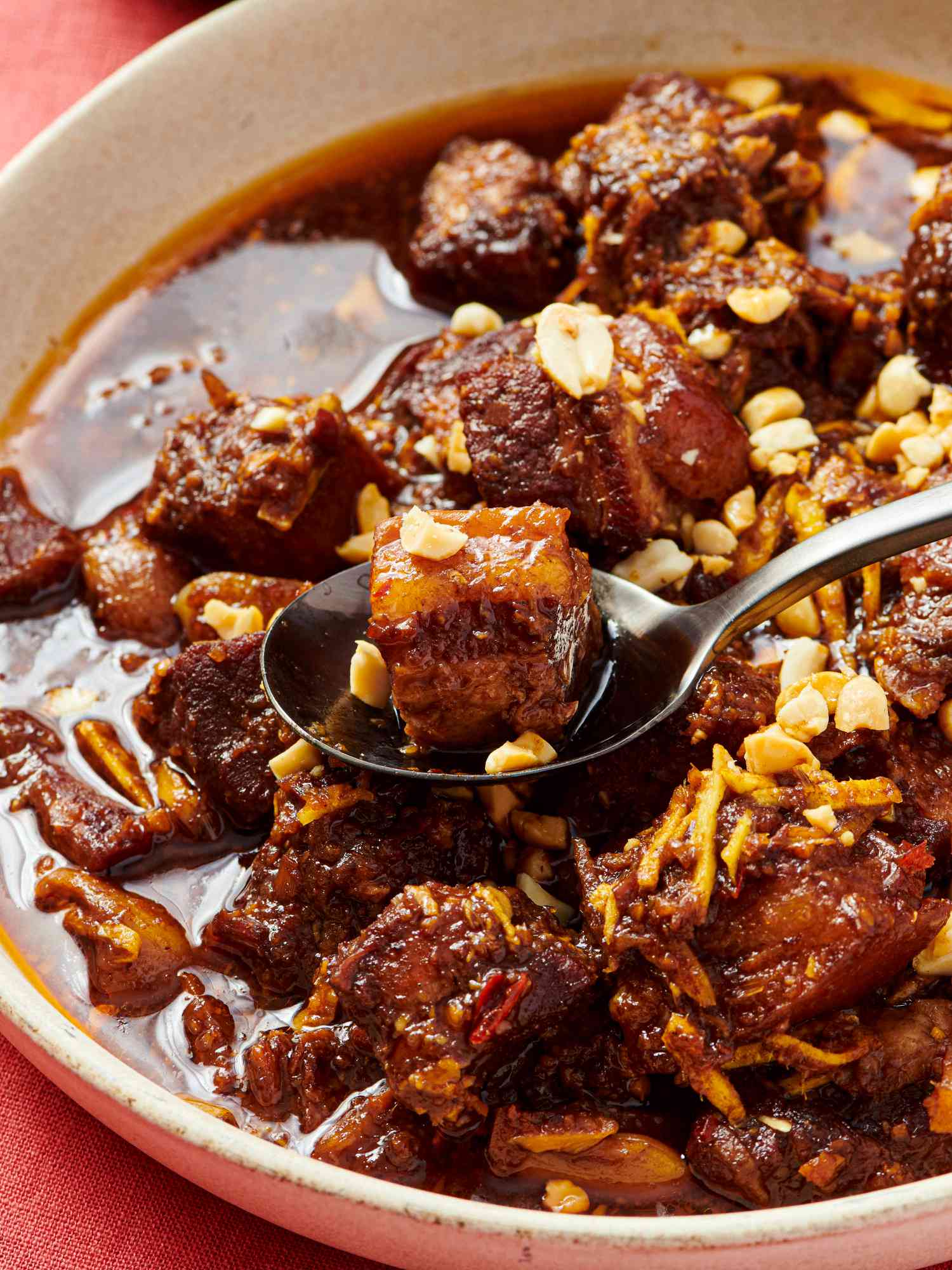 Overhead of stew in a bowl with spoon.