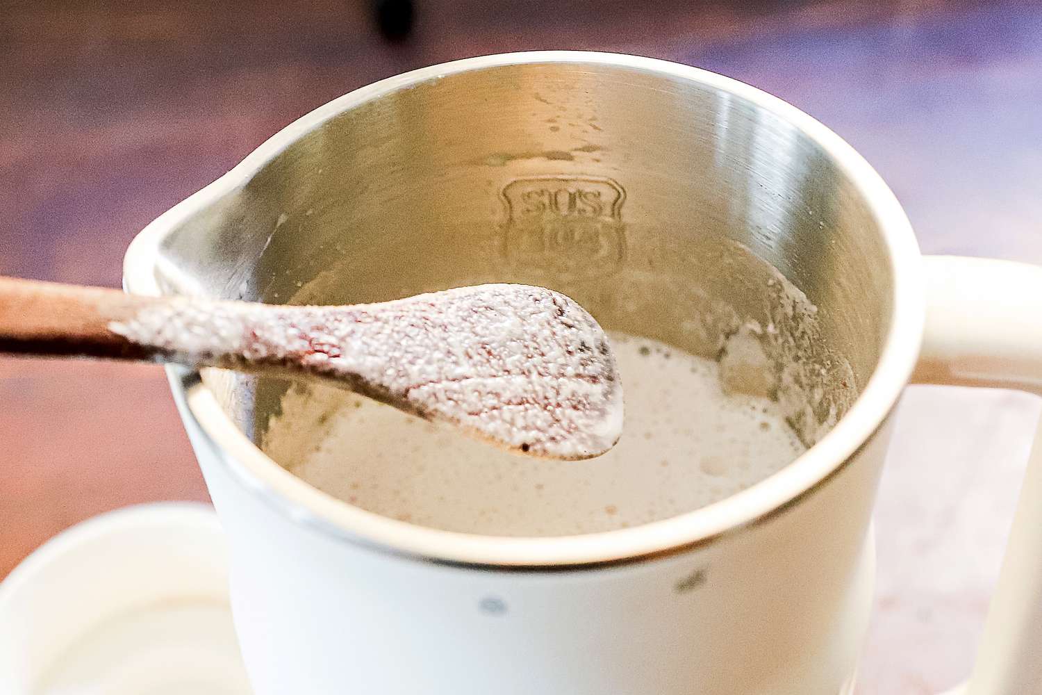 a carafe full of nut milk from the alfabot 