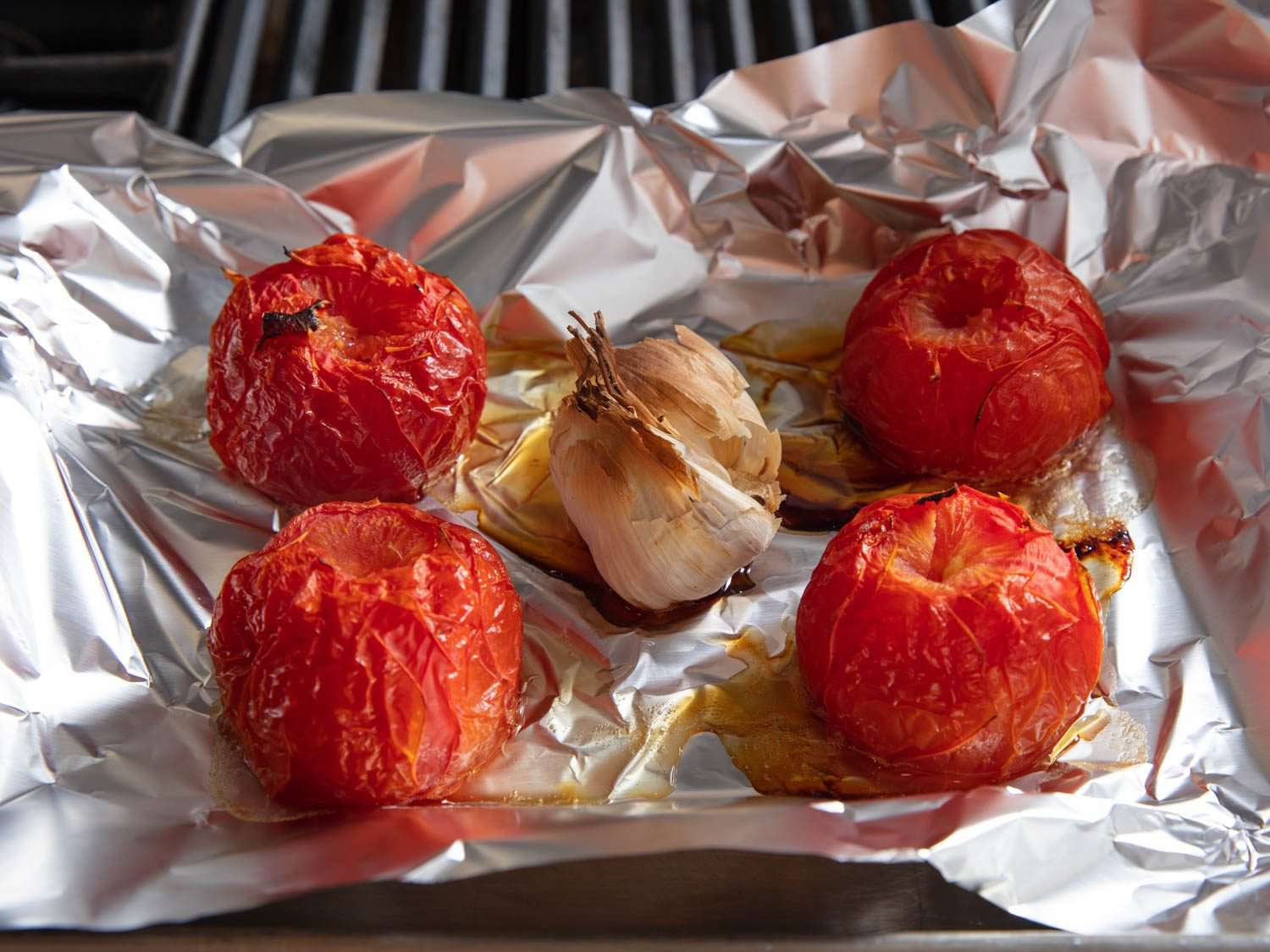 Roasted tomatoes and garlic, for romesco sauce.