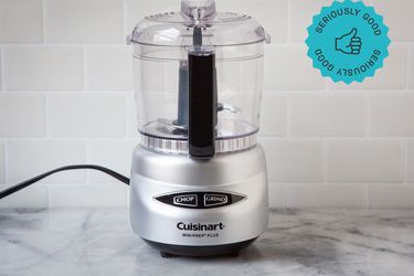the cuisinart mini food processor on a marble countertop