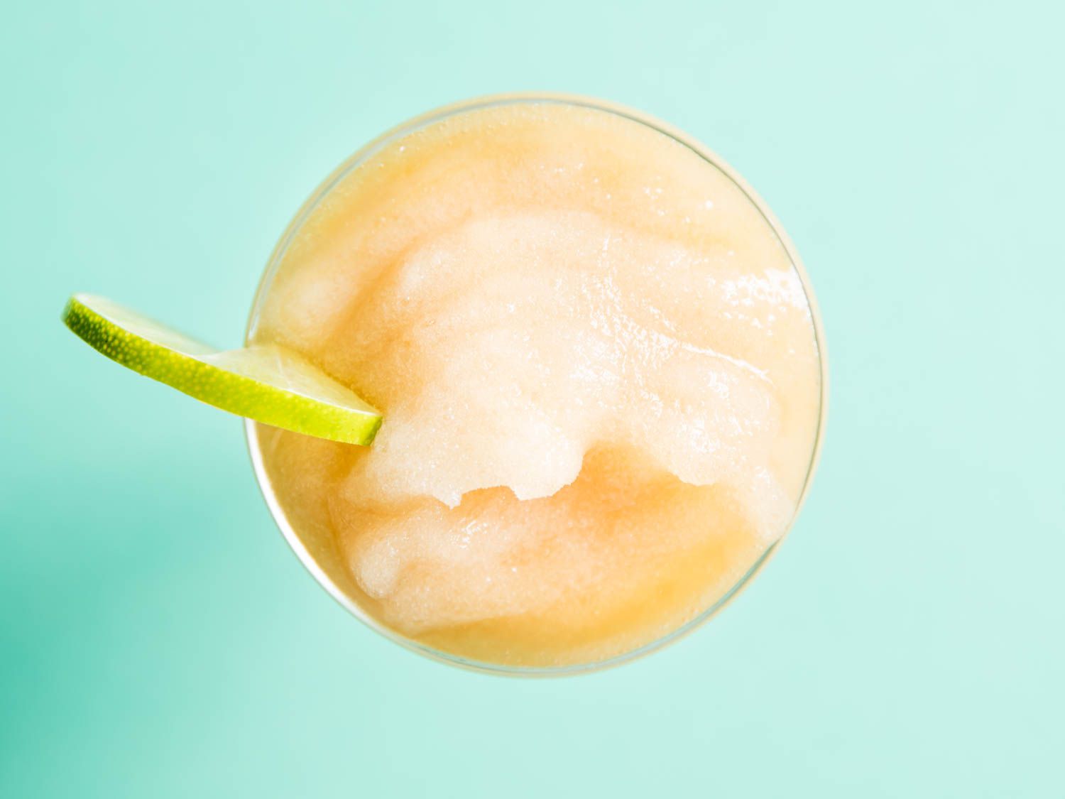 Top down view of a glass of frozen daiquiri. 