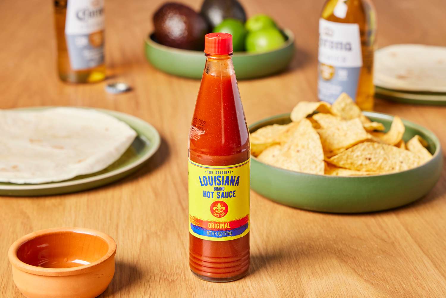 Louisiana The Perfect Hot Sauce on table