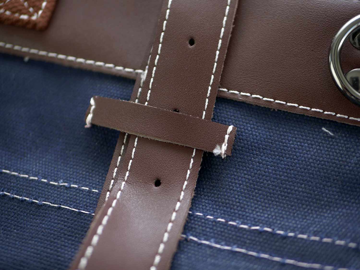a closeup of the loose stitching on the Sunday X Best knife roll
