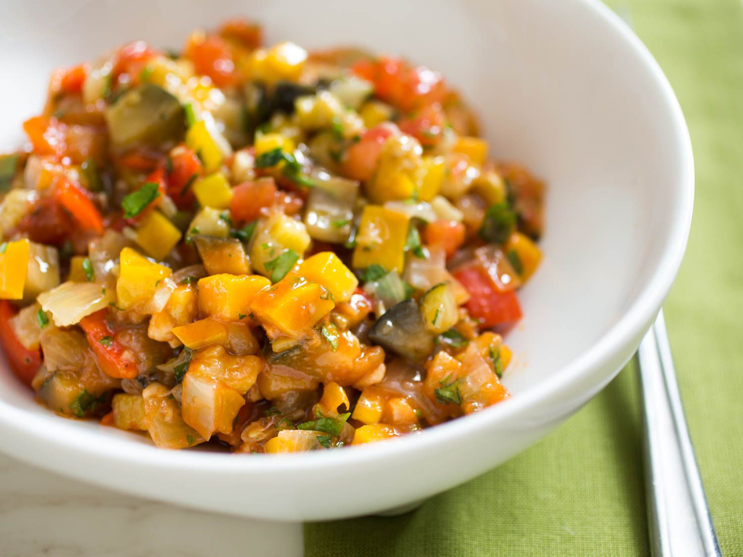 A close-up of a bowl of Provençal ratatouille.